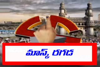 తెలంగాణ: పోలింగ్ కేంద్రంలో మాస్క్‌ రగడ..భాజపా, తెరాస శ్రేణుల మధ్య గొడవ