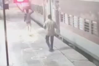 Man survives fall between platform and a moving train