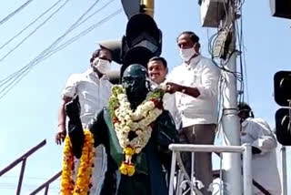 minister koppula garlands ambedkar statue at jagtial