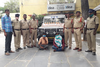 two persons arrested for smuggling alcohol