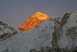 Mt Everest's new height