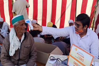 Farmers undergoing treatment in medical camp