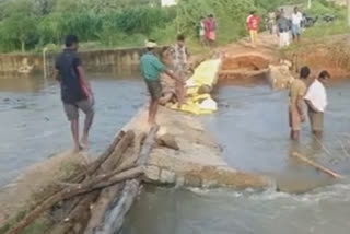 Residents build temporary bridge to reach their villages