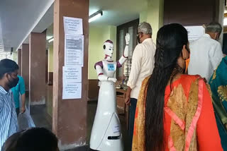 sayabot robot ensure covid protocol  thrikkakkara community hall polling booth  സായാബോട്ട് റോബോട്ട്  അസിമോവ് റോബോട്ടിക്‌സ്  തൃക്കാക്കര കമ്മ്യൂണിറ്റി ഹാൾ പോളിങ് ബൂത്ത്