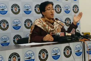 atishi doing press conference