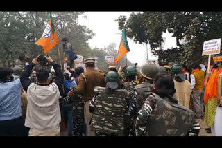 BJP workers reach Manish Sisodia's office by breaking barricades,, shouting slogans