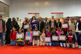 photo exhibition held at hussainganj metro station