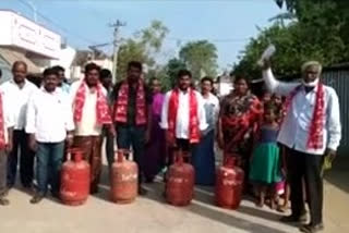 cpm protest at nandhigama agaist price hike on gas cylinder