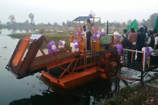 aquatic harvester machine brought for cleaning Dalpat Sagar