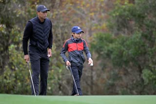 Watch: Tiger Woods practices with his son Charlie ahead of PNC Championship