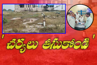 Nalgonda Villagers in front rice mill agitated waste chemicals discharged into pond.