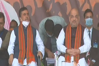 amit shah breaks covid norms, claims prashant bhushan