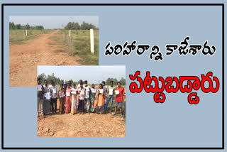 two officers were suspended in taking housing land compensations at srikakulam district