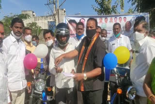 mla-vidya-sagar-rao-distributie-bikes-to-fishermen-at-metpally-in-jagtial-district