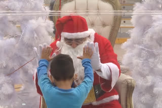 Santa cheers up kids in Peru amid COVID measures