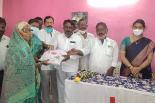 alampur mla distributed christamas gifts behalf of ts go