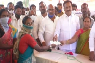 Gampa Govardhan distributing Kalyana Lakshmi checks