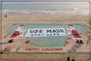 CHRISTMAS WISHES WITH USE OF MASKS BY SAND ARTITST SUDARSHAN