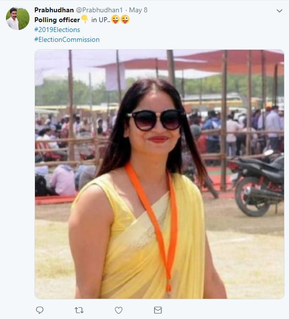 polling officer in yellow saree.