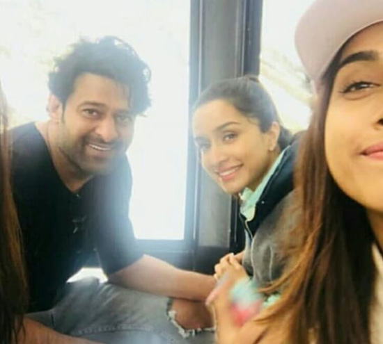 rebal star prabhas rounds in astria metro train with shradha kapoor