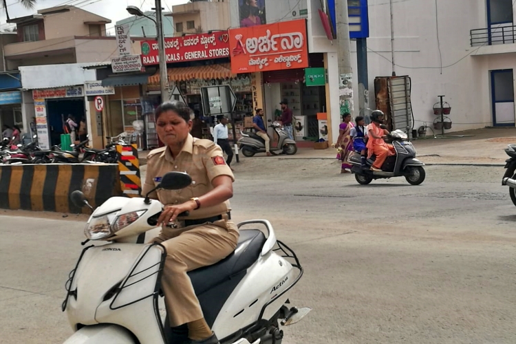 A policeman who rode a bike without a helmet