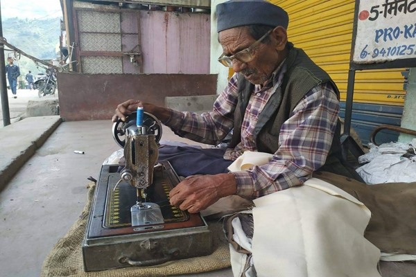 The octogenarian tailor says he began sewing when he was 22 years old