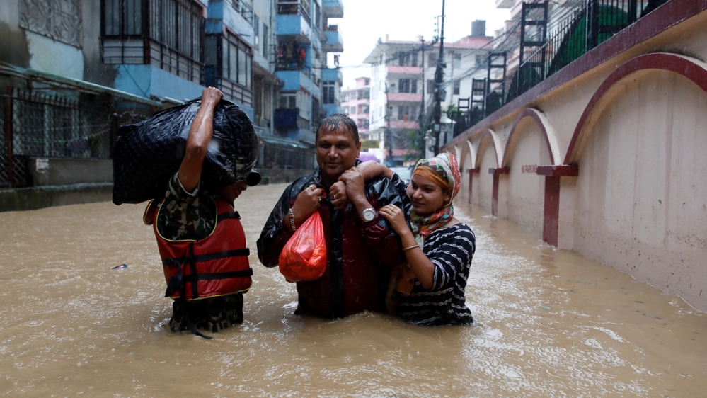 Nepal floods  Floods in Nepal  Nepal Meteorological Forecasting Division  Ram Bahadur Thapa  காத்மாண்டு  நேபாளம்  கனமழை  வெள்ளப்பெருக்கு  பலி