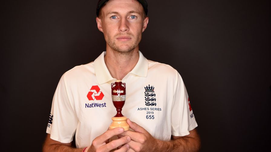 JOE ROOT WITH ASHES TROPHY