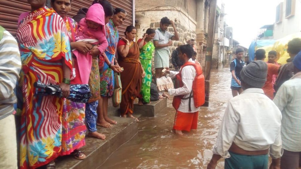 NDRF distributed biscuits and other food items