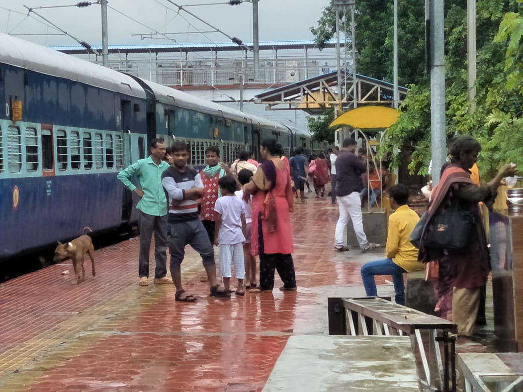 water-on-railway-track-train-stopped-at-station