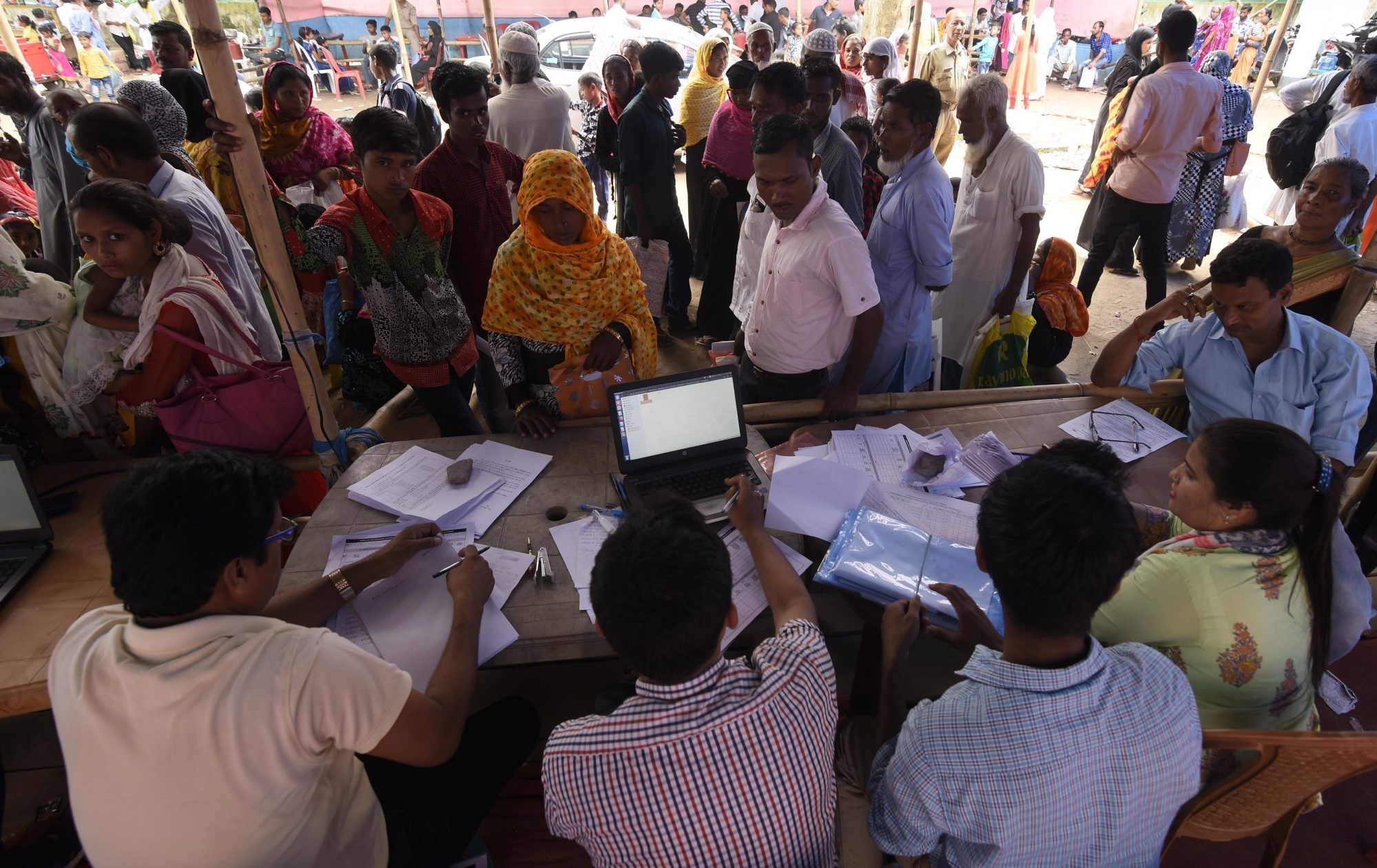 People queue up at NRC office to get documents checked for inclusion of names