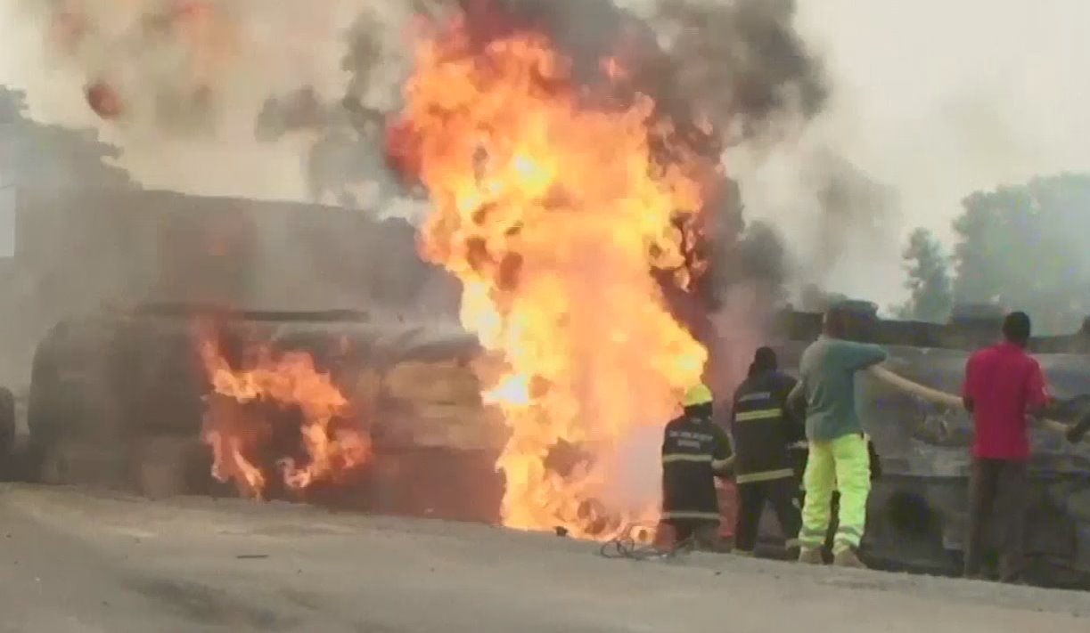 Firefighter battling to control the blaze in Kyamburua on Sunday