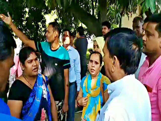 Guest teachers protest at the residence of education minister Krishnanandan Verma