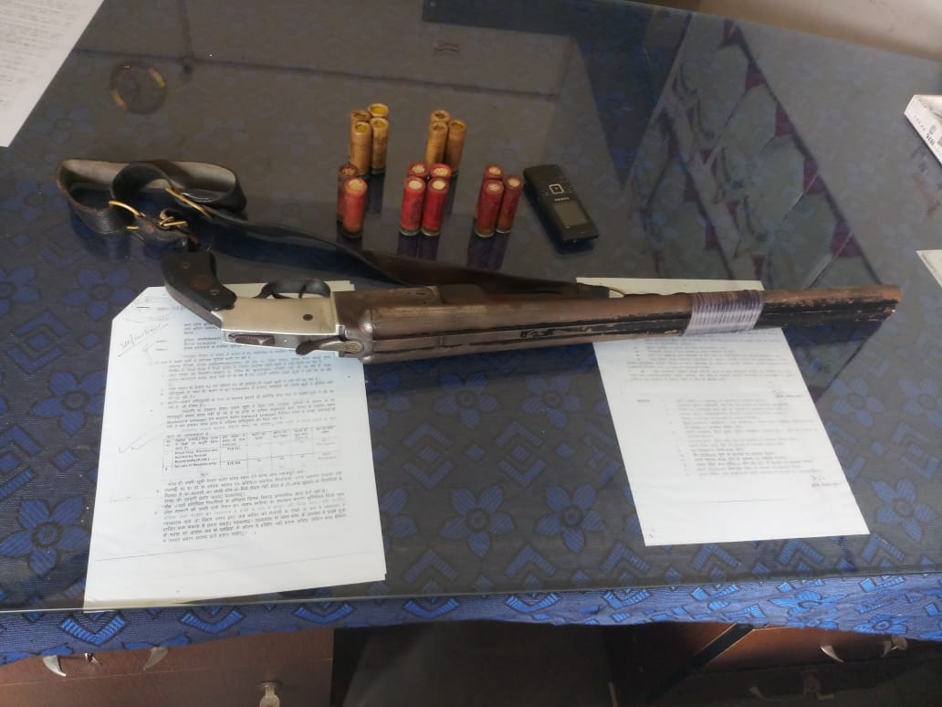 A regular rifle and sixteen live cartridges also recovered