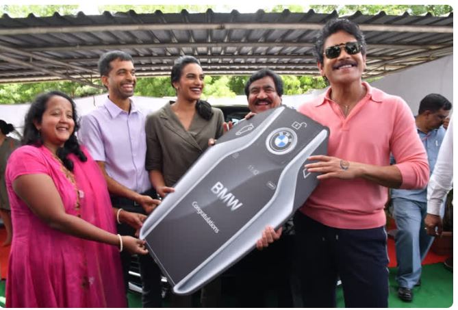 P.V. Sindhu presented with BMW car by V. Chamundeswaranath