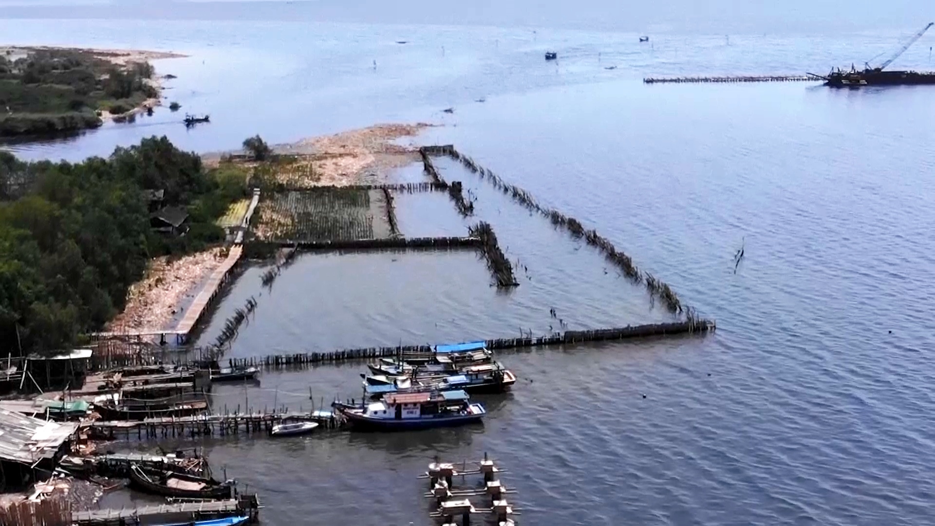 Fishing villages and coastal areas of Jakarta which have begun to be submerged in sea water.