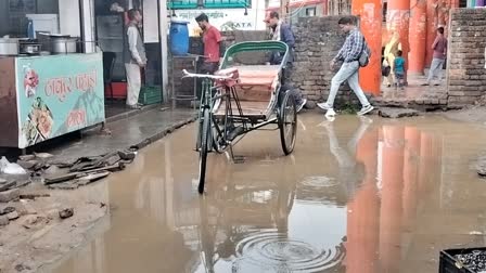 Roads filled with water after rain in Paonta Sahib.