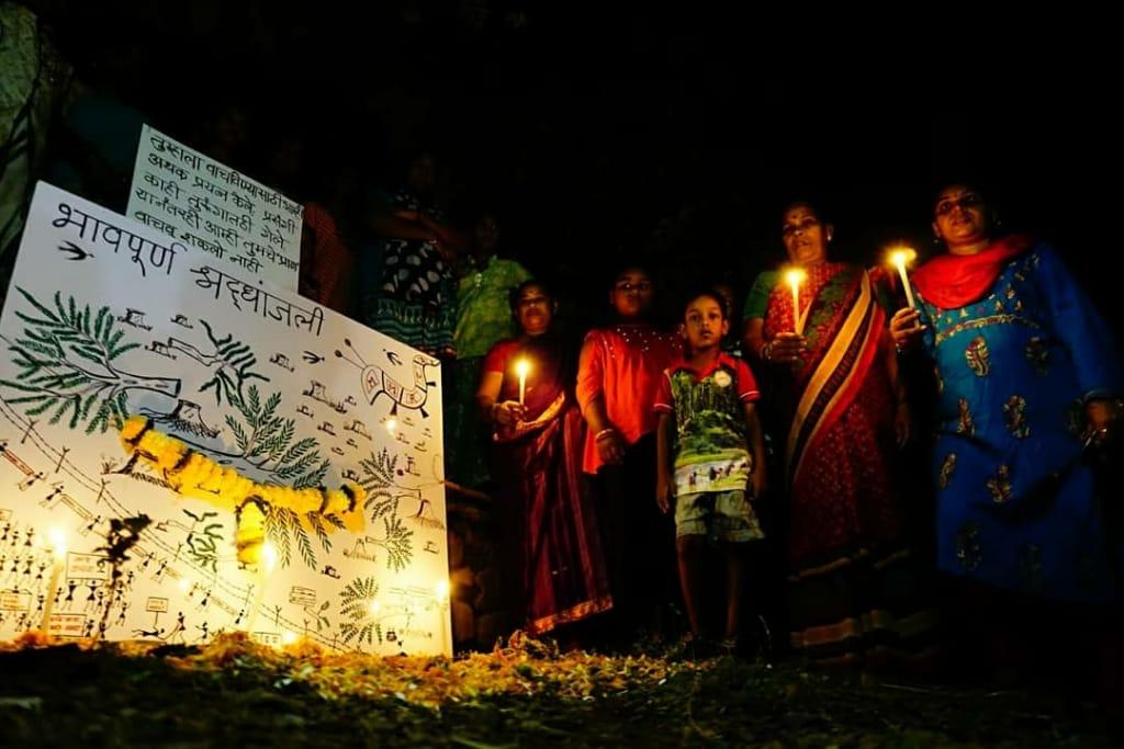 Members of local Adivasi community pay tribute to felled trees of Aarey forest