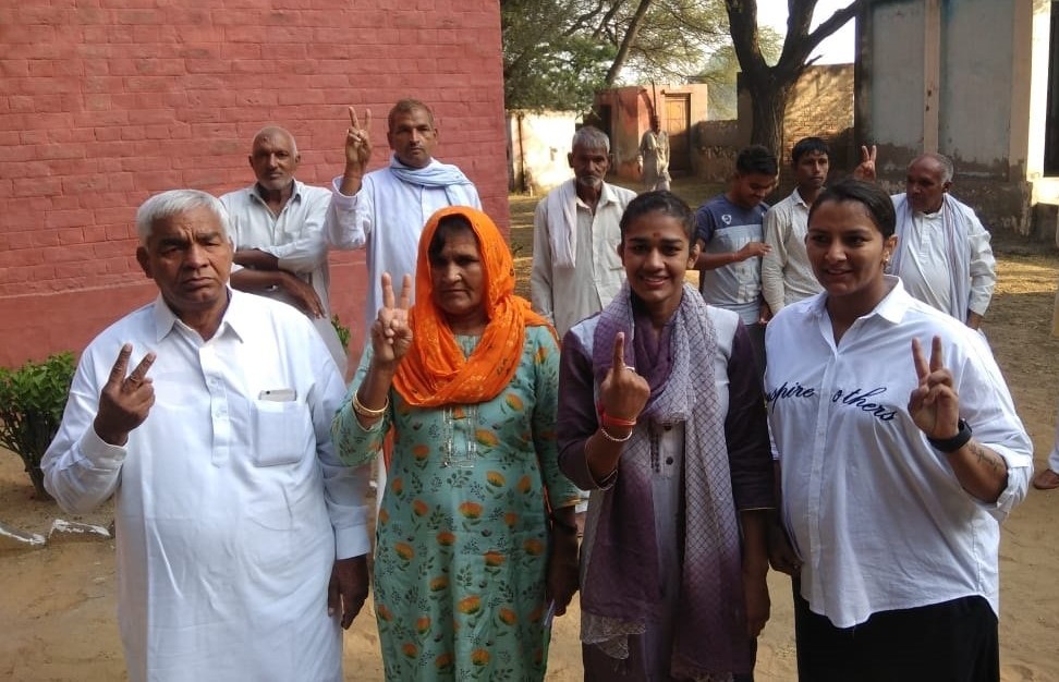 Phogat family poses after casting their vote