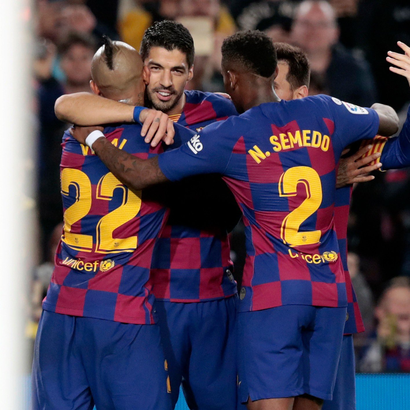 Luis Suarez celebrates after scoring a goal.