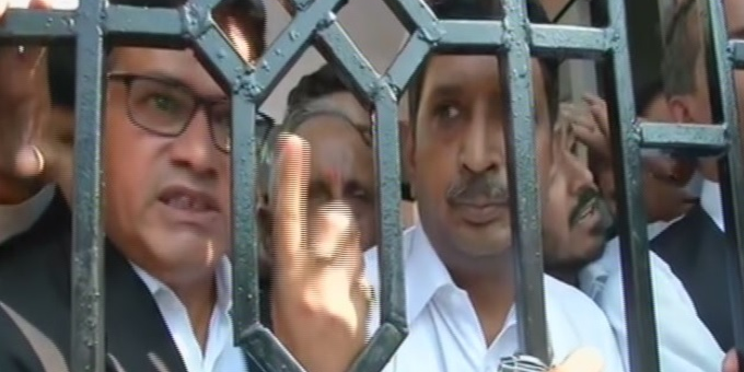 Angry lawyers gathered outside the district courts in Rohini and Saket