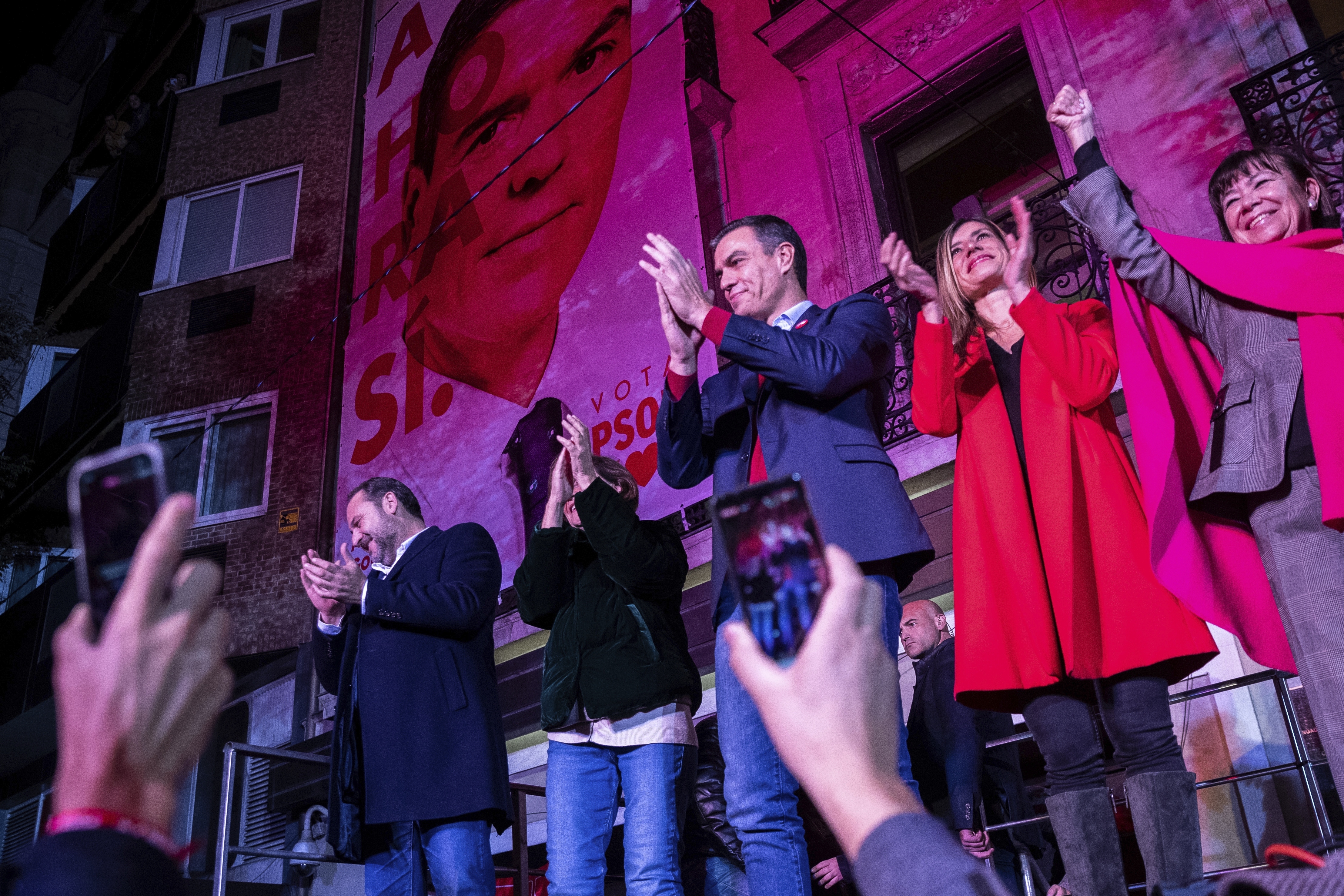 Socialist Party leader Pedro Sanchez applauds outside the party headquarters following the general election on Sunday.