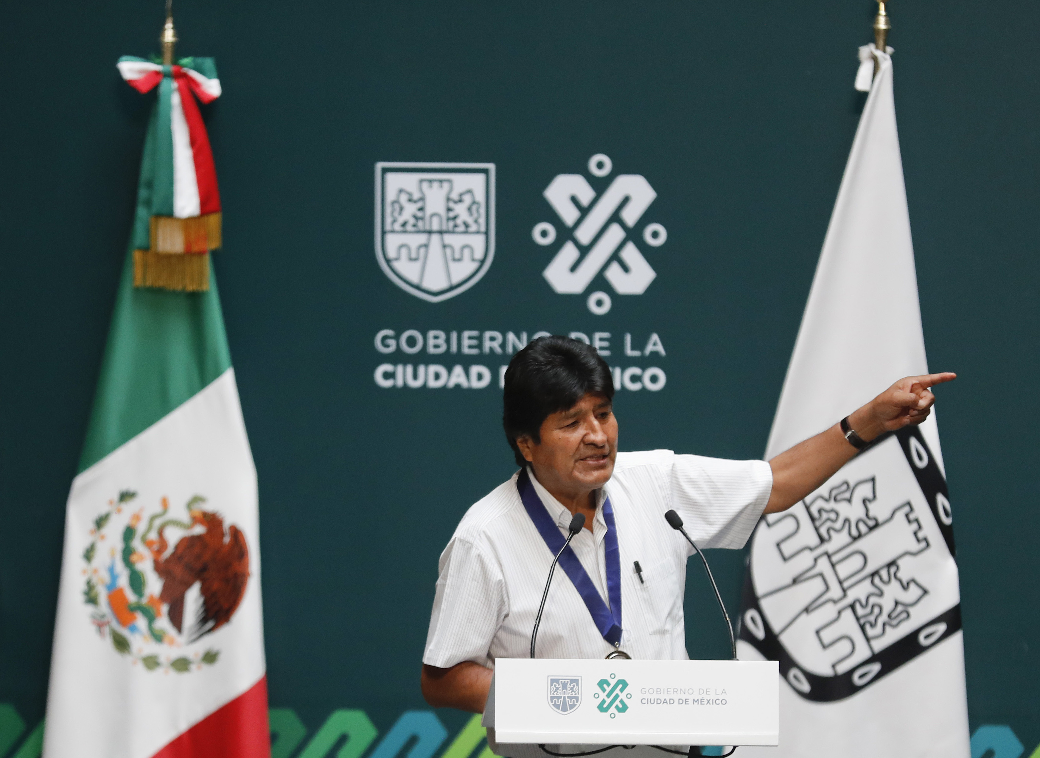 Former Bolivian President Evo Morales delivers his address after he was decorated with a distinguished citizen medal at City Hall in Mexico City on Wednesday.