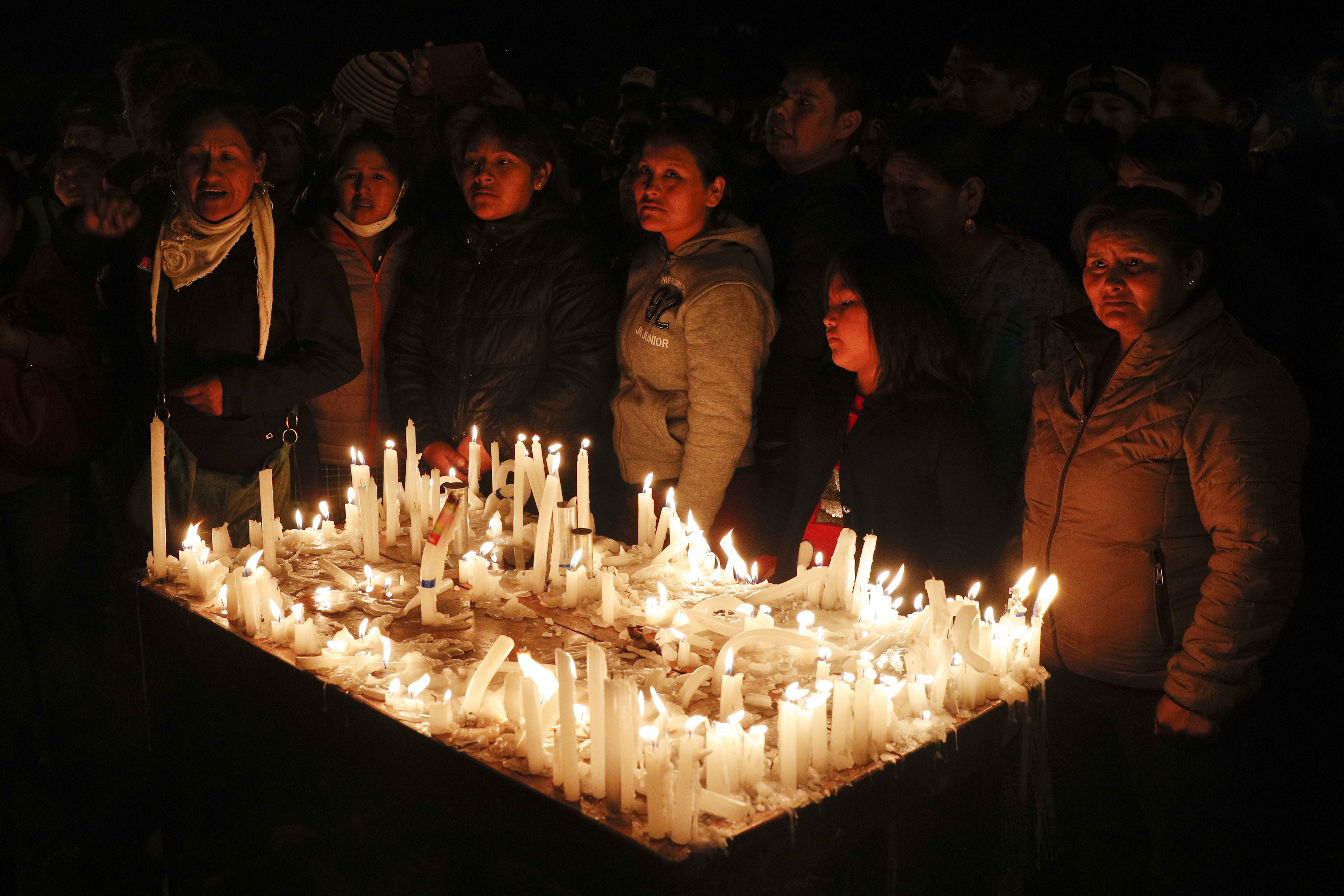 Mourners attend the funeral of backers of former President Evo Morales that died during clashes with security forces in Sacaba, Bolivia, on Friday.