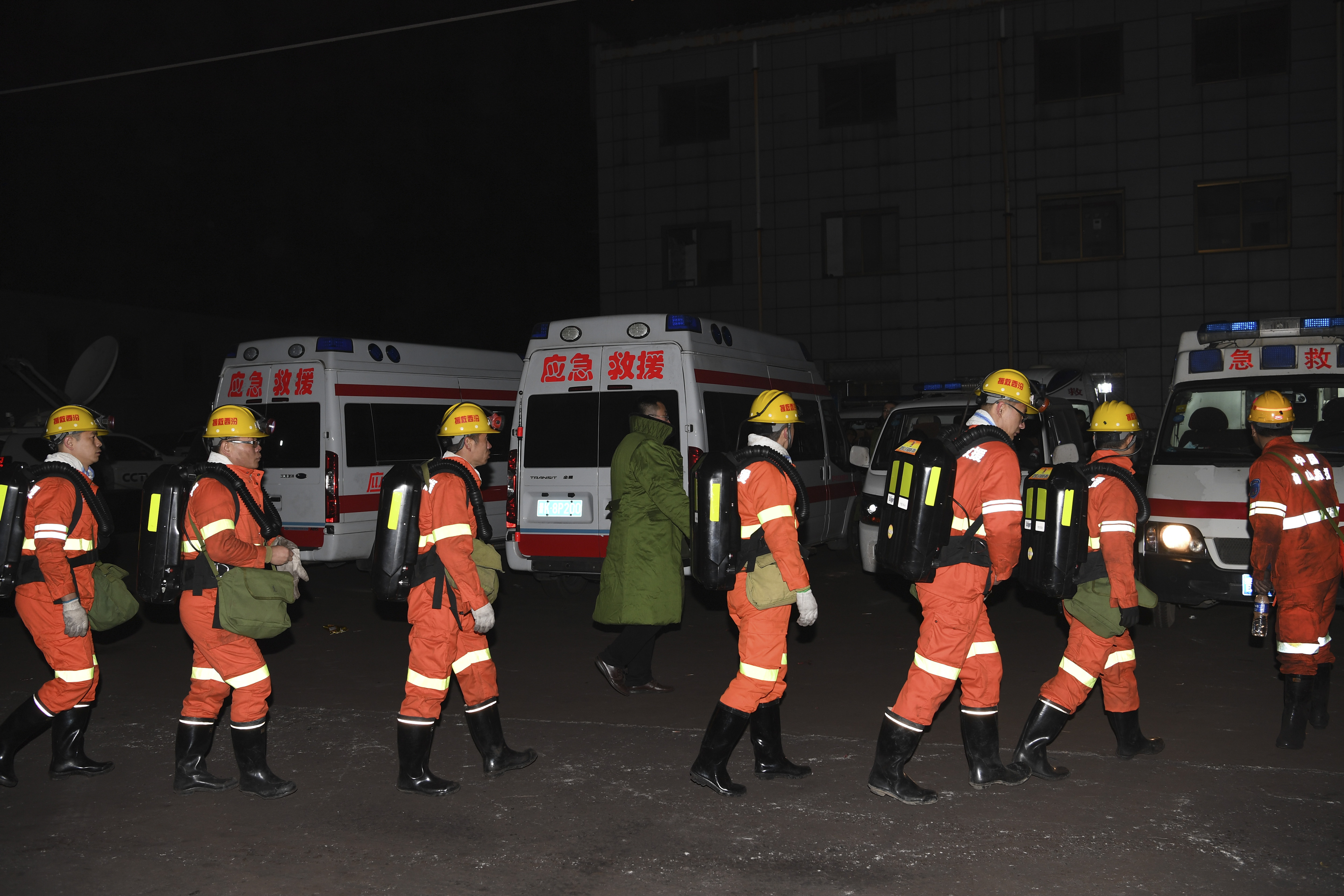 Rescuers prepare to enter a coal mine that was the site of a gas explosion