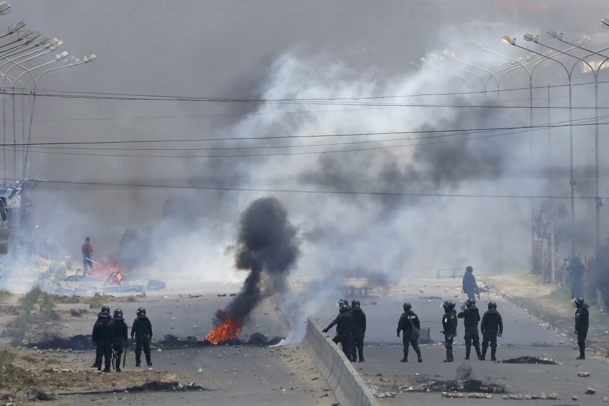 Soldiers guard the state-own Senkata filling gas plant in El Alto, on the outskirts of La Paz, Bolivia on Tuesday.