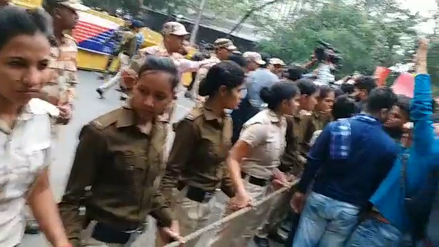 JNU protest Students stand on barricading slogans on sansad Marg