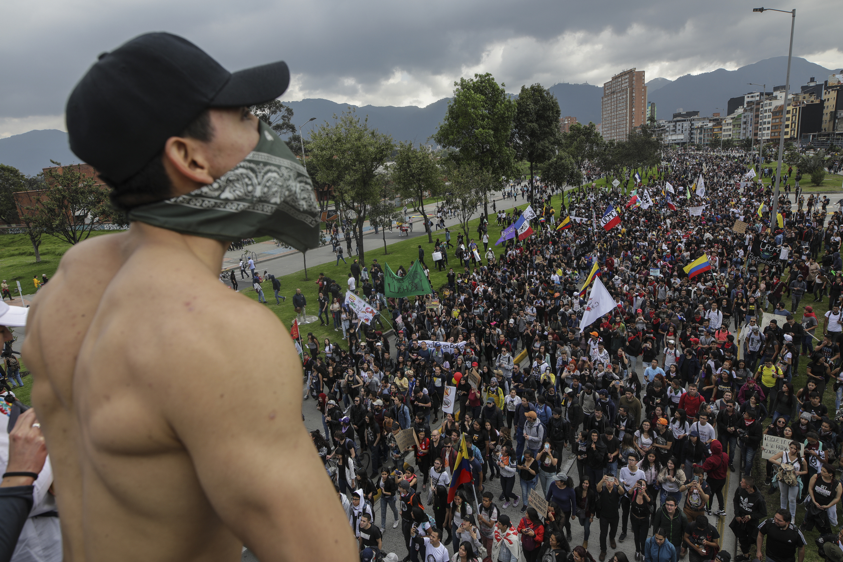 Anti-government protesters march in Bogota, Colombia, on Thursday.