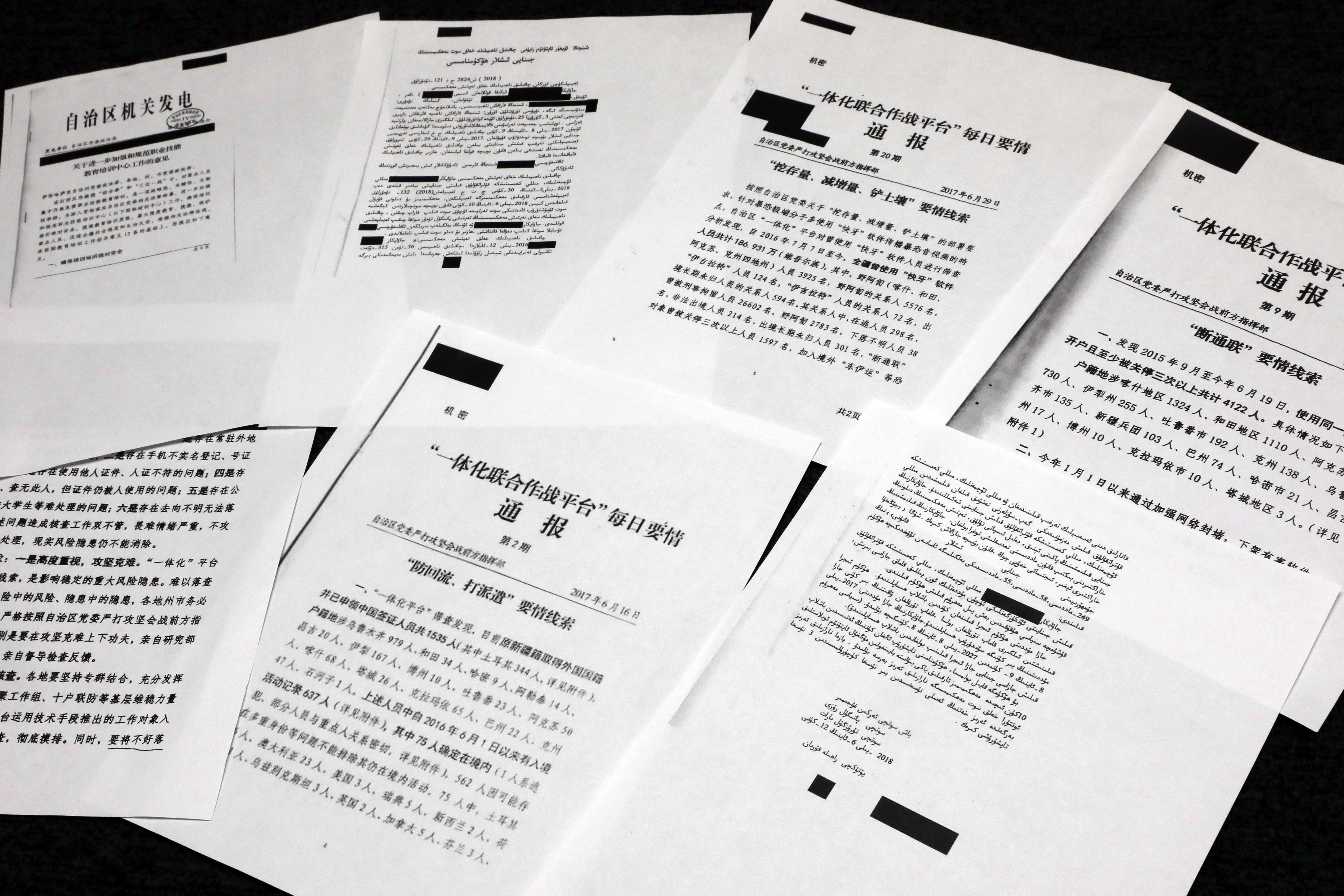 A sample of classified Chinese government documents leaked to a consortium of news organizations, is displayed for a picture in New York, Friday.