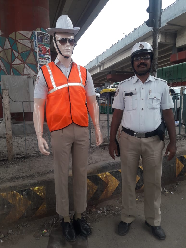 a new trafic man doll trend at bengalooru